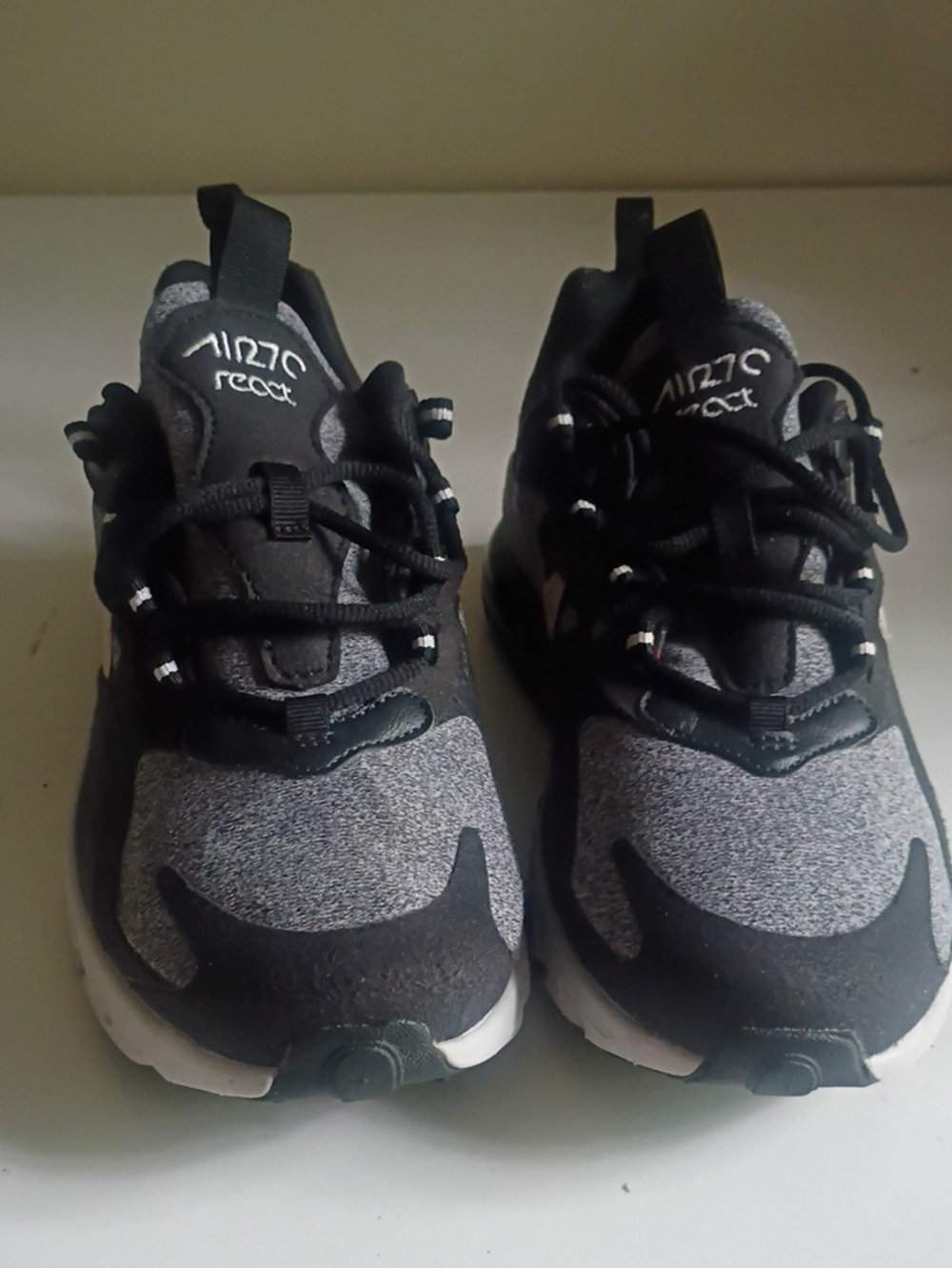 Nike Air Max 270 React sneakers featuring a black and grey 5.5y